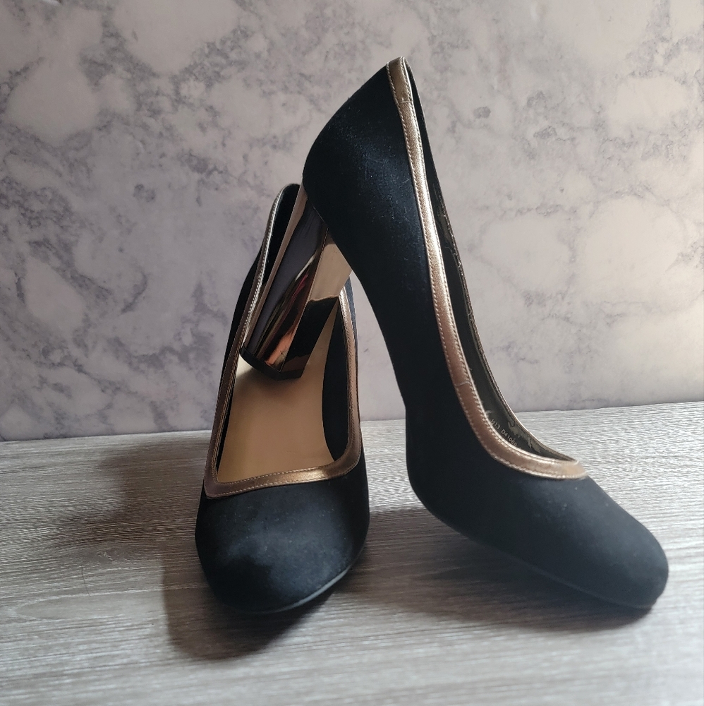 Cole Haan black suede shoes with gold trim and heels,